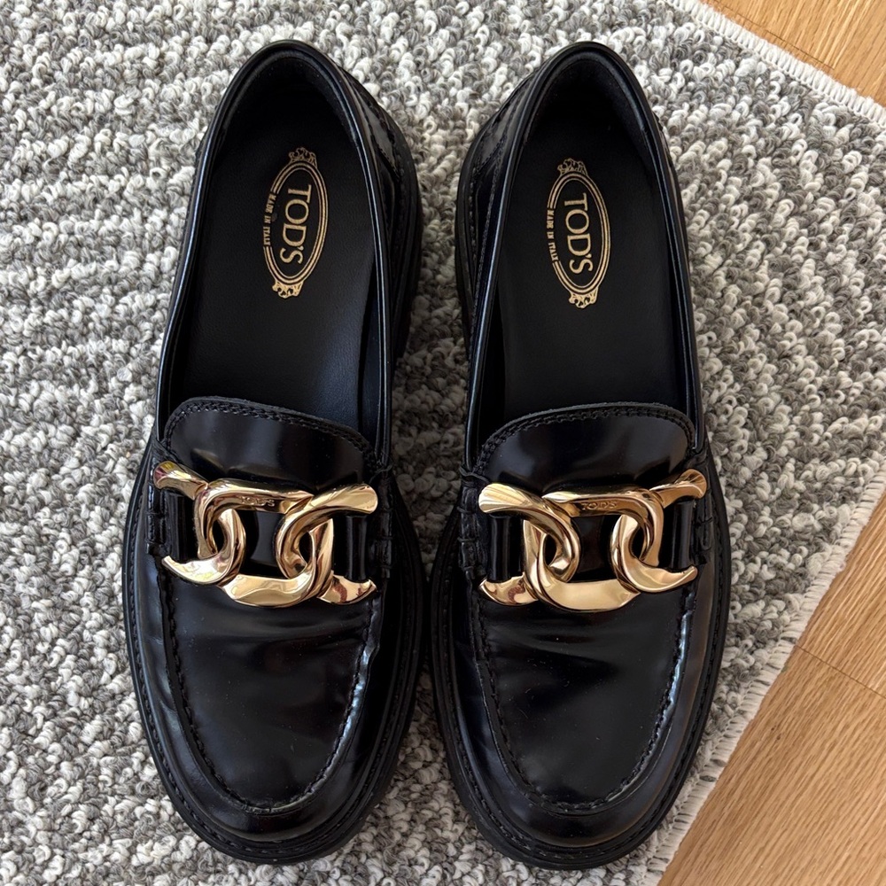 Tod's Black Loafers with Gold Chain Detail